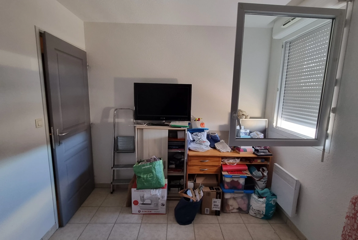 Appartement T3 loué avec parking à Villerest - Investissement locatif 