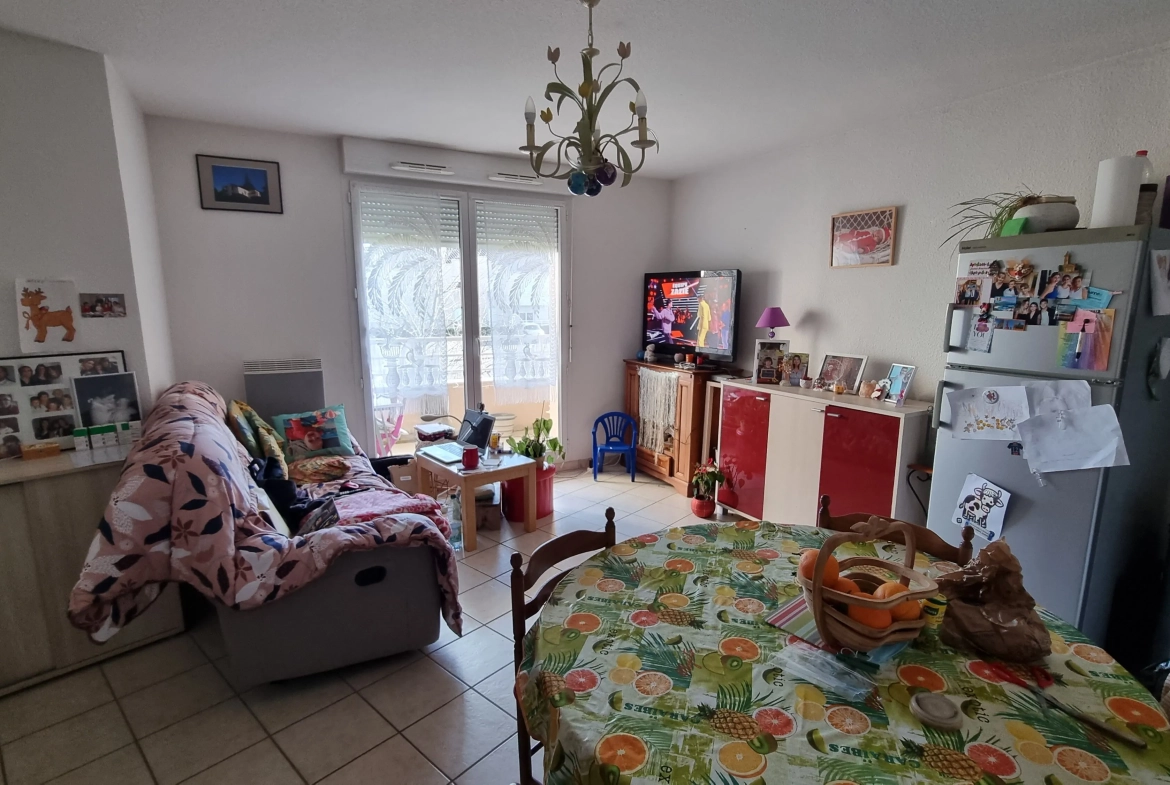 Appartement T3 loué avec parking à Villerest - Investissement locatif 
