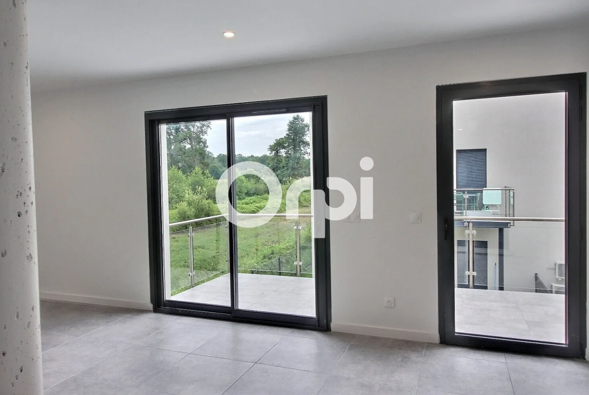 Appartement duplex neuf à Idron avec terrasse et parking, performance énergétique A 