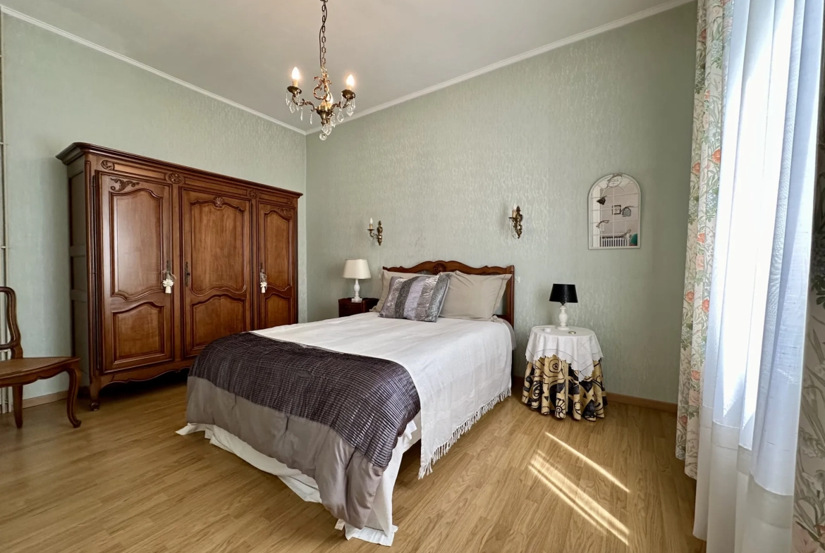 Maison à vendre à Beaumont de 94 m2 avec deux habitations et terrain arboré 