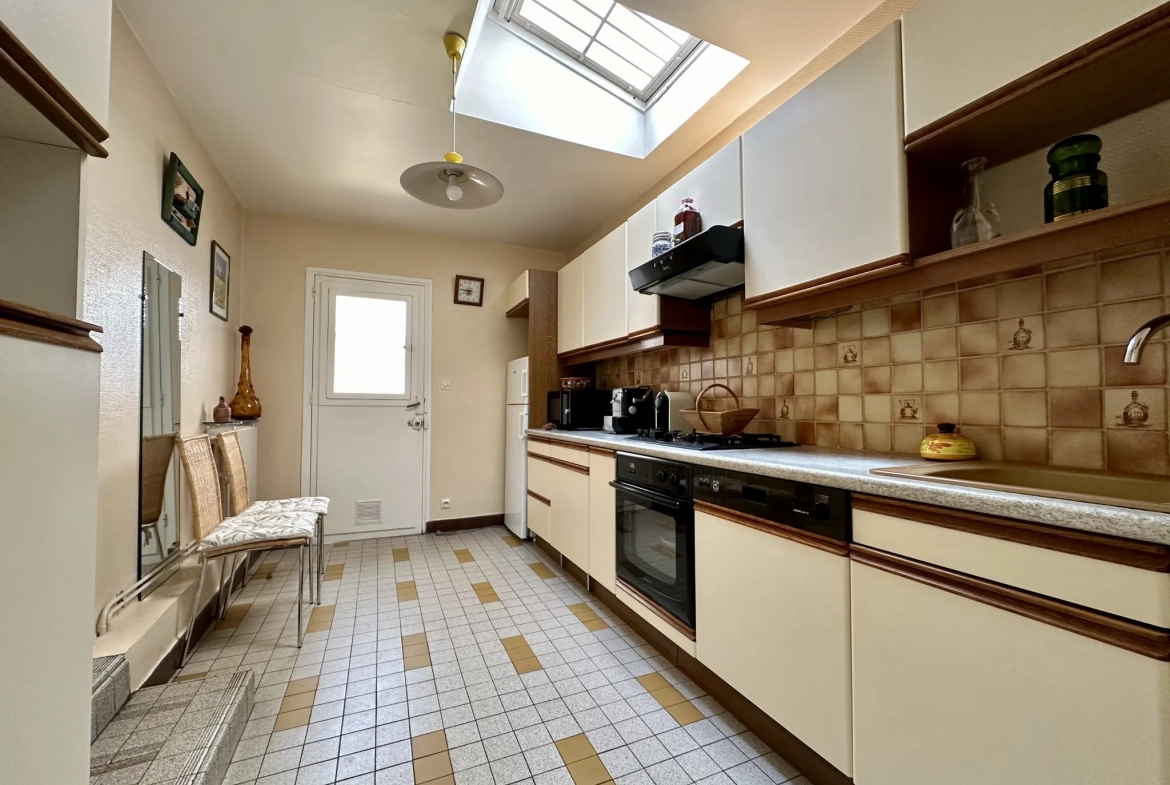 Maison à vendre à Beaumont de 94 m2 avec deux habitations et terrain arboré 