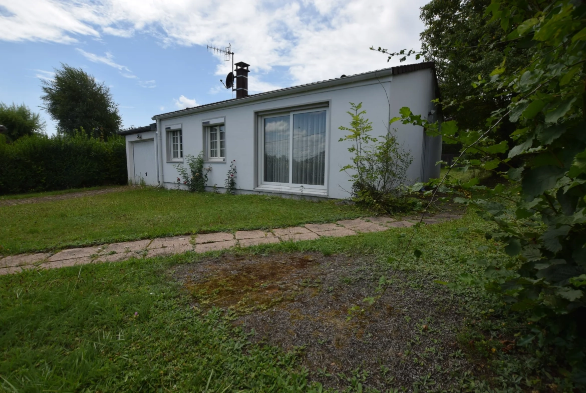 Maison de plain-pied à vendre à Chatenois-les-Forges avec jardin et garage 
