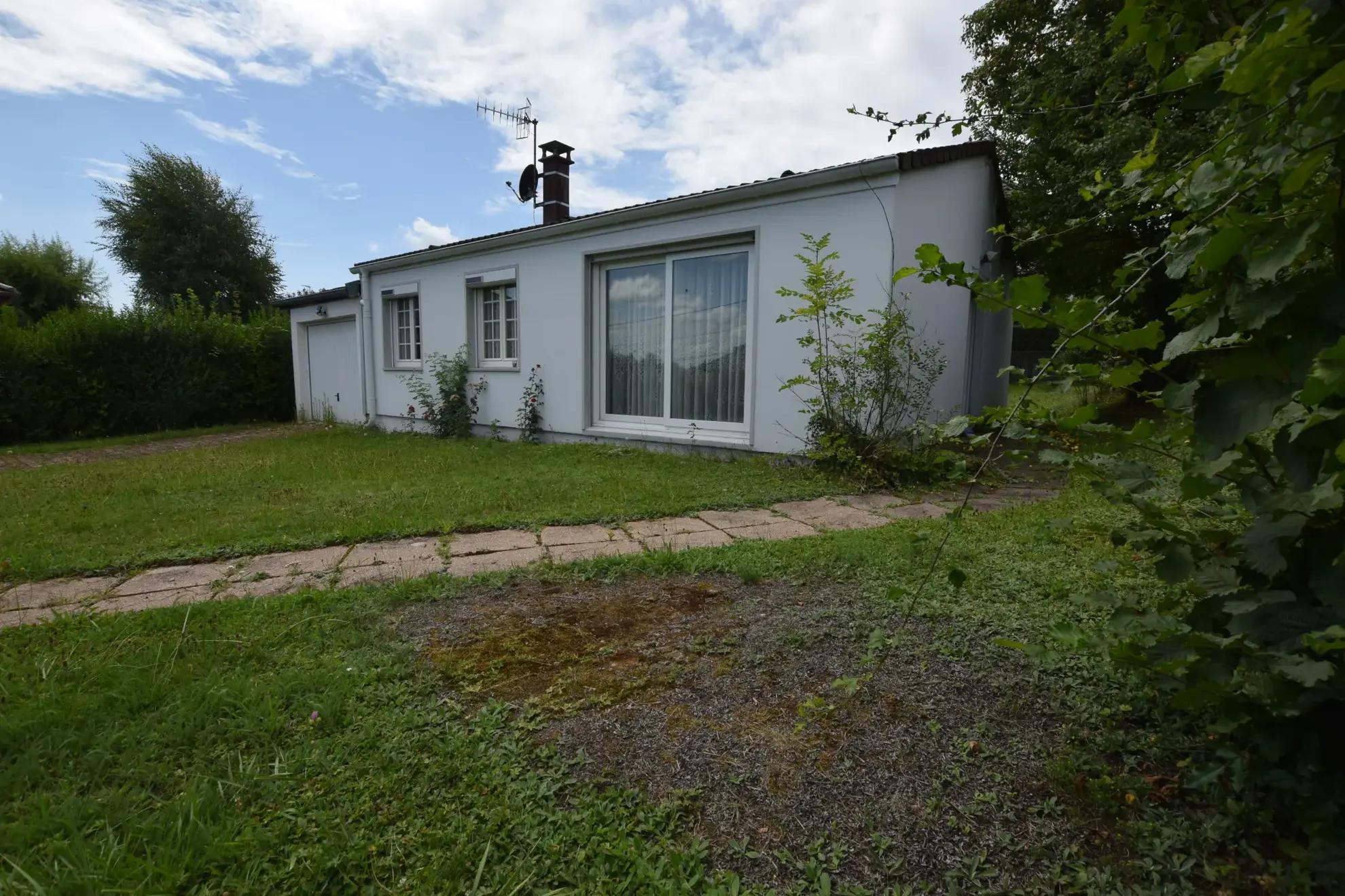Maison de plain-pied à vendre à Chatenois-les-Forges avec jardin et garage 