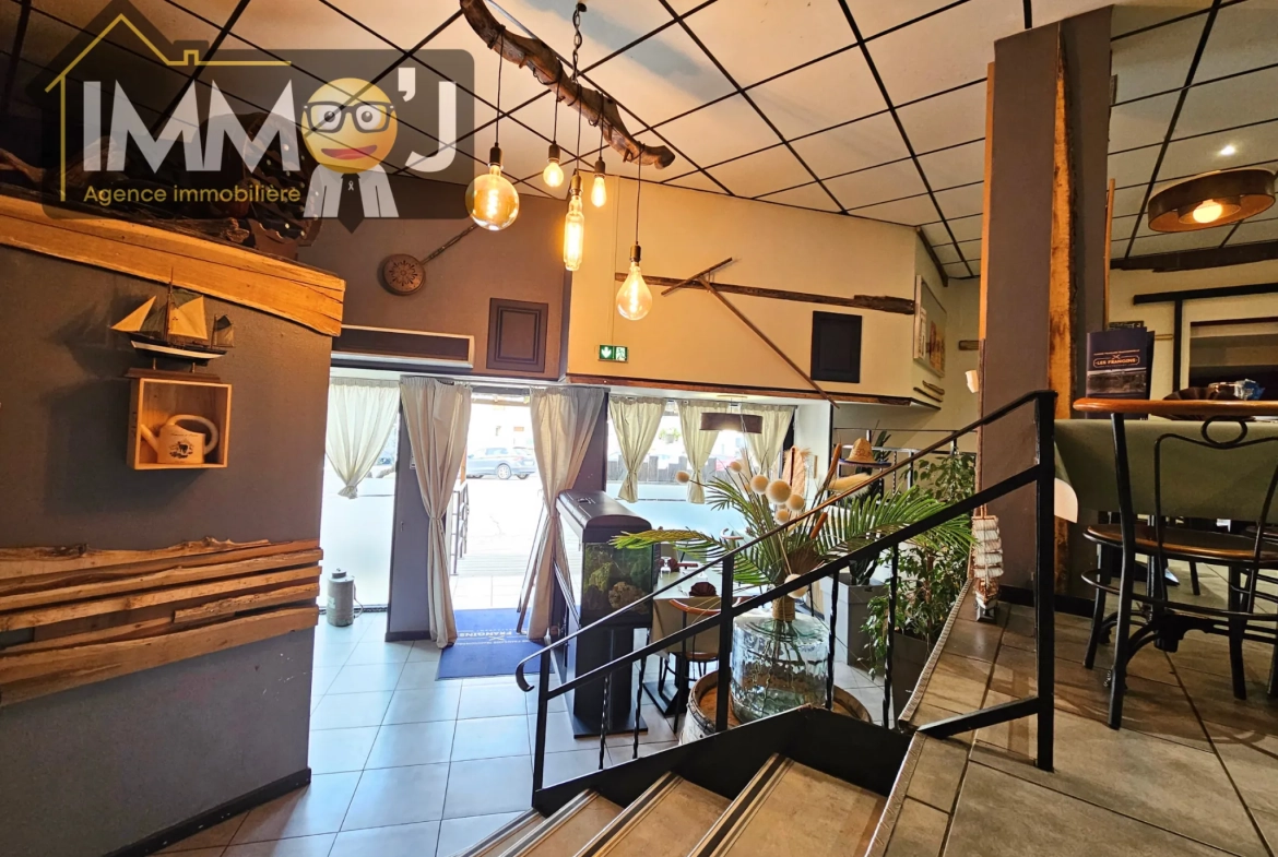 Immeuble à vendre à Neuves-Maisons avec commerce, appartement et garage - Opportunité d'investissement 