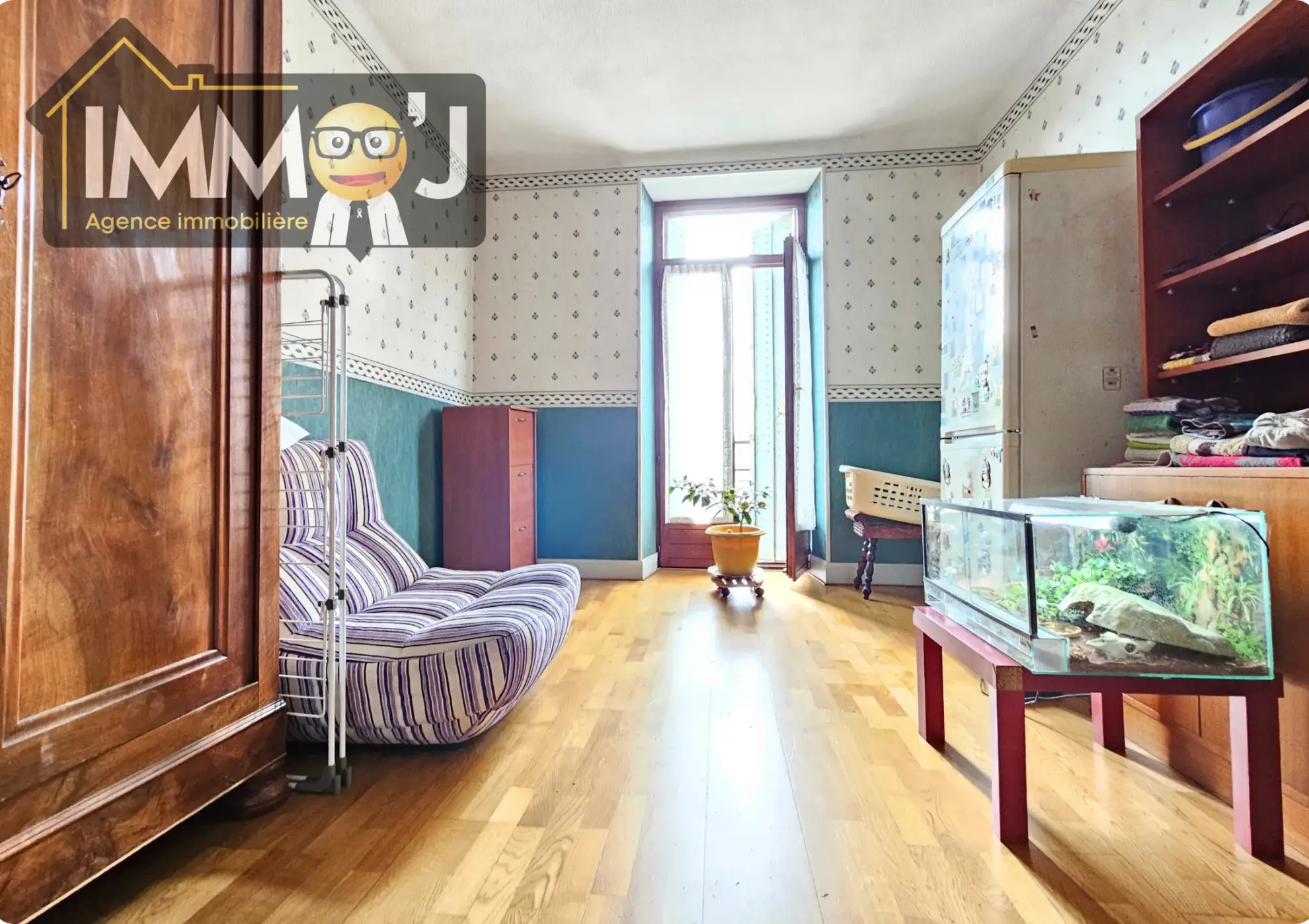 Immeuble à vendre à Neuves-Maisons avec commerce, appartement et garage - Opportunité d'investissement 