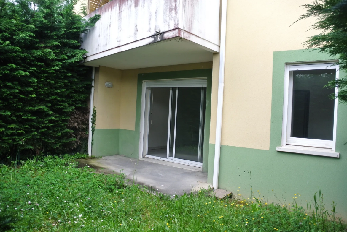 Appartement rez-de-jardin 1 chambre à Marmande avec parking et terrasse 