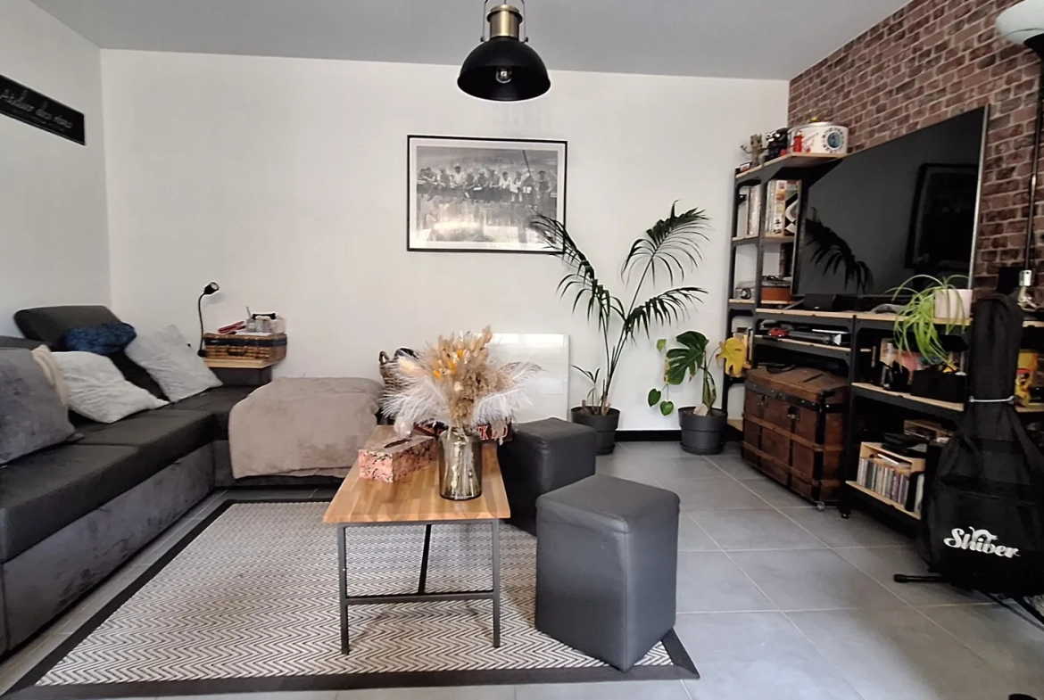 Maison rénovée en plein bourg de Coëtmieux avec jardin et 3 chambres 