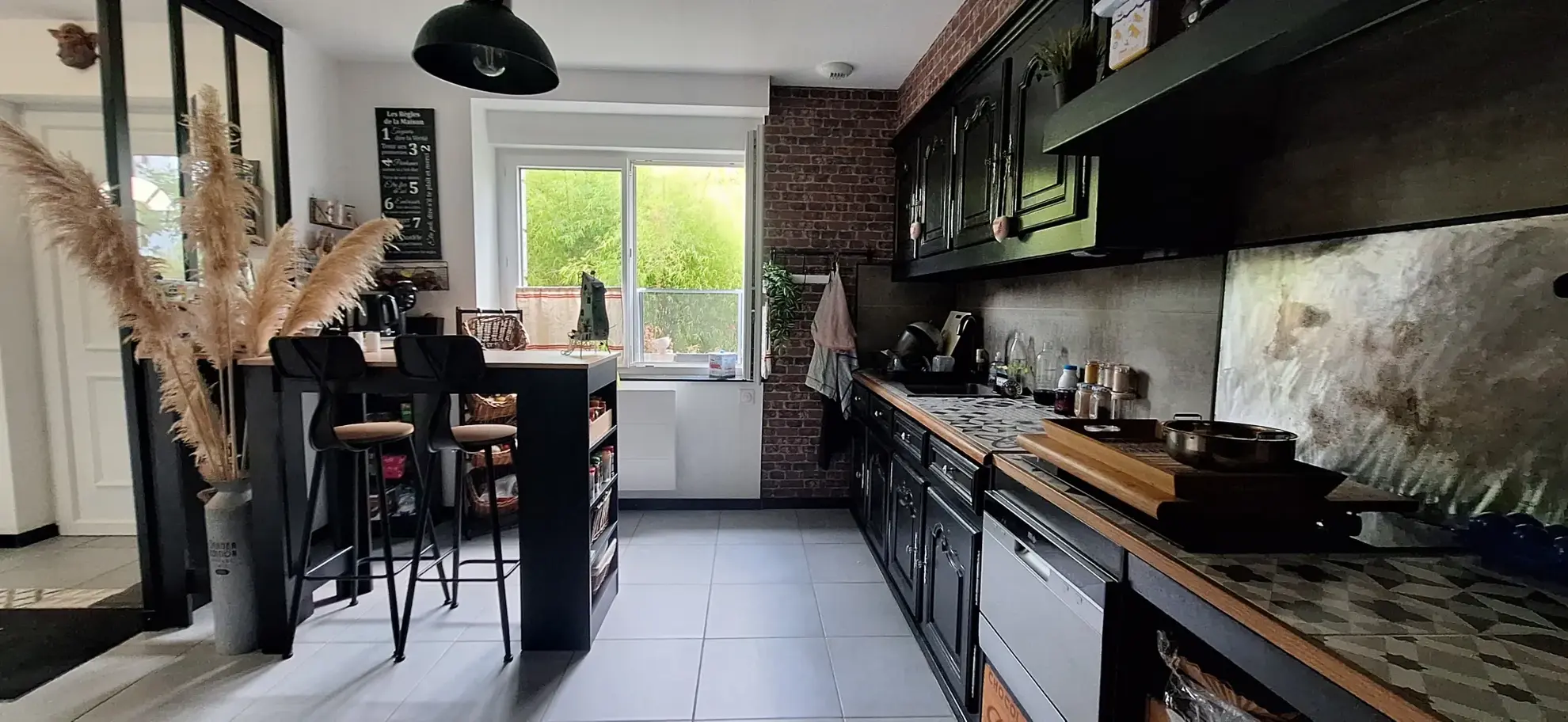 Maison rénovée en plein bourg de Coëtmieux avec jardin et 3 chambres 
