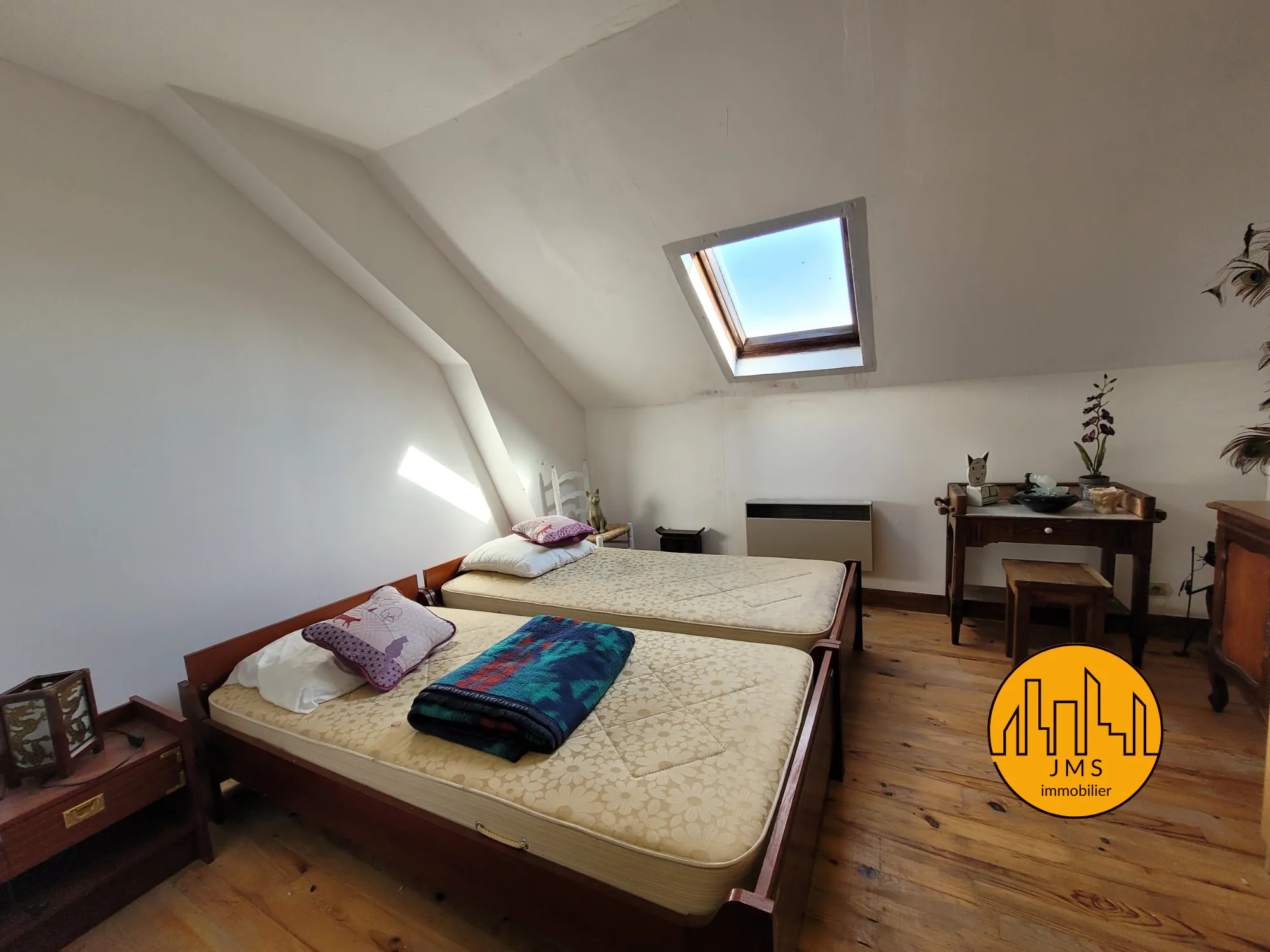 Maison de village à Noyant d'Allier avec jardin, 2 chambres et travaux à prévoir 