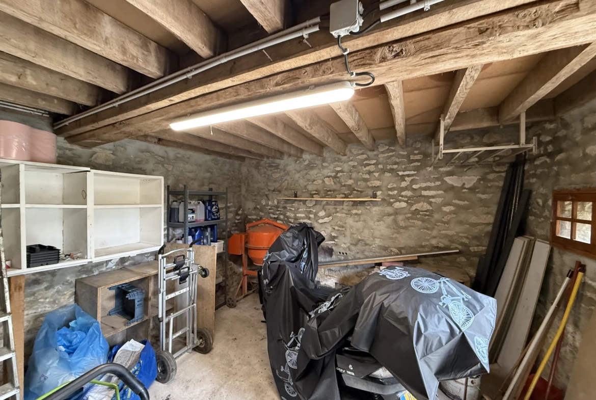 Maison en pierre de 142 m² à Saint Pierre des Nids avec terrain et garage 