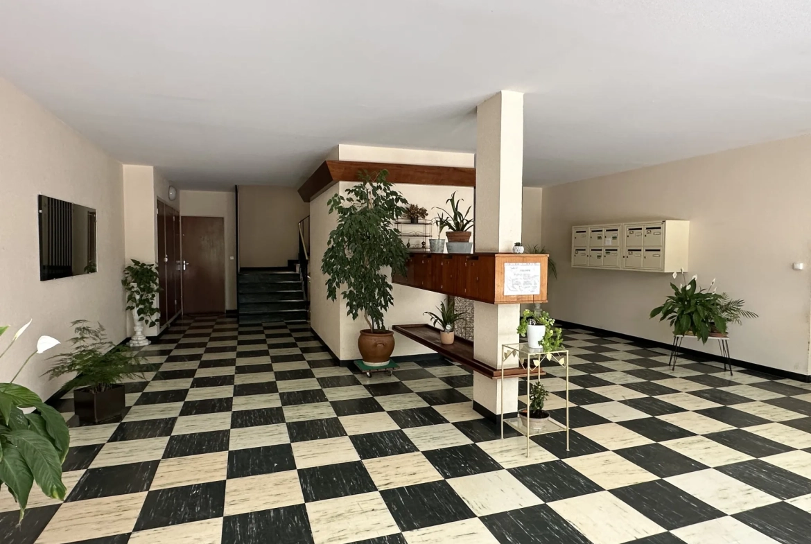 Appartement lumineux de 57 m2 à Loudun avec balcon, cave et garage 