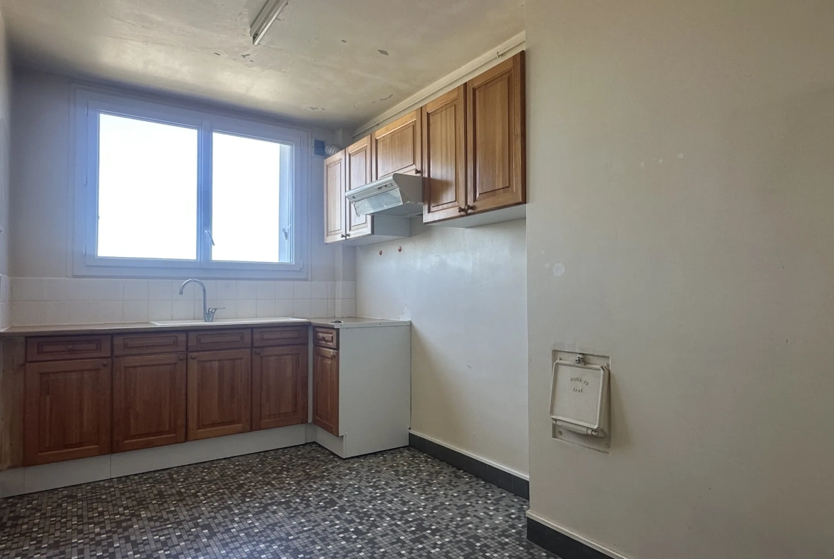 Appartement lumineux de 57 m2 à Loudun avec balcon, cave et garage 
