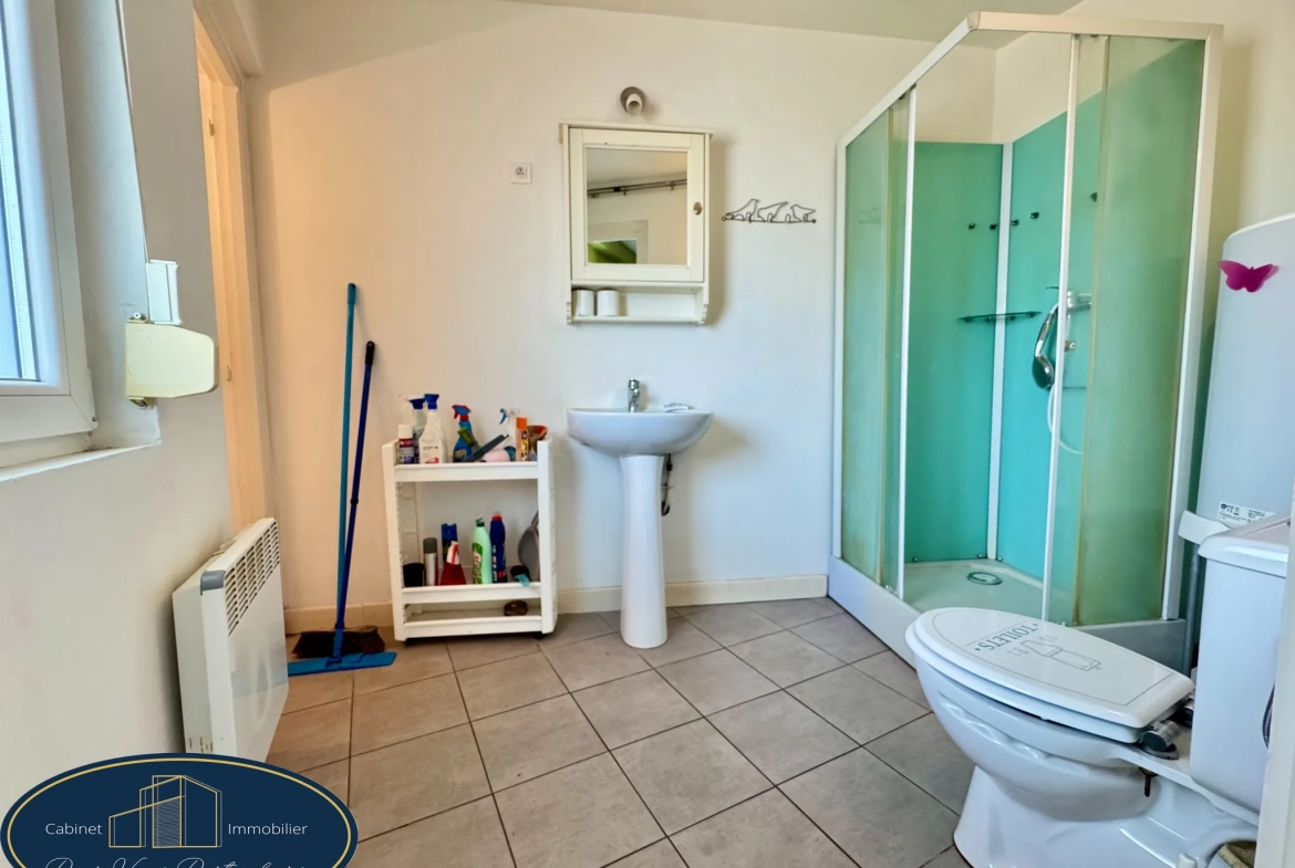 Maison mitoyenne de 86 m² à Aniche avec jardin et dépendances 