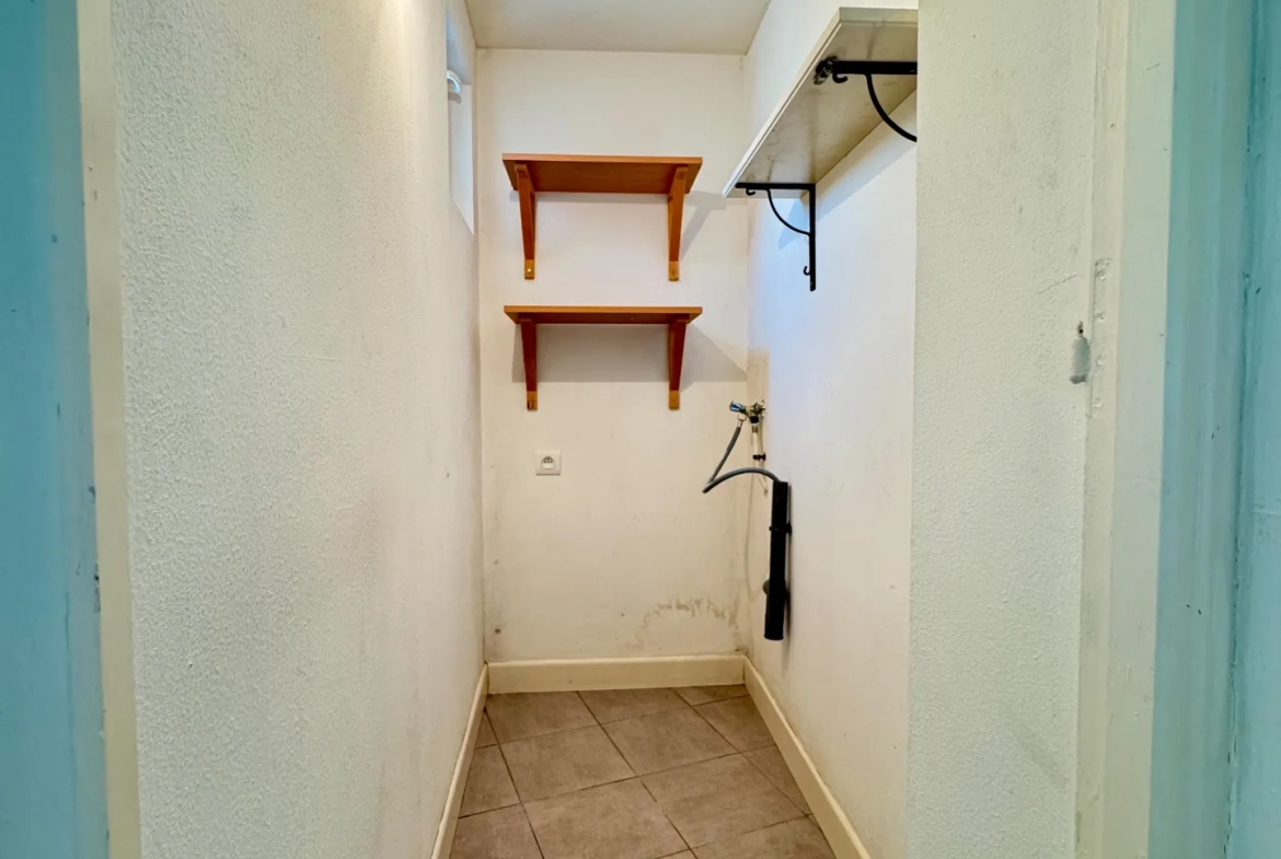 Maison mitoyenne de 86 m² à Aniche avec jardin et dépendances 