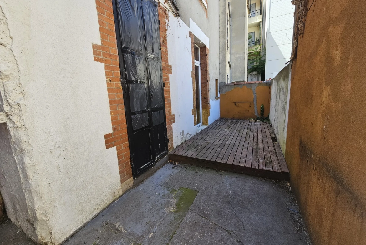 Maison de ville 3 chambres avec garage à Vichy – Appartement rénové ou à moderniser 