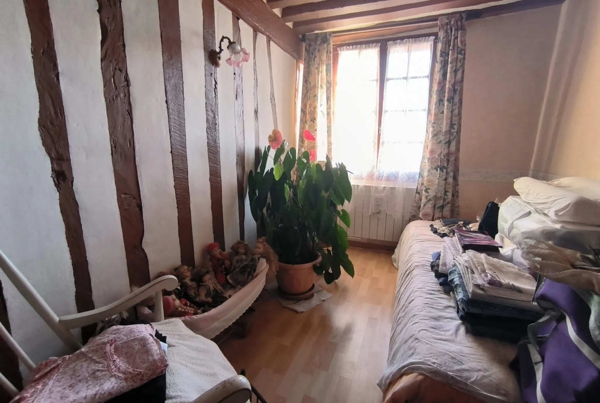 Maison à vendre à Orival en viager occupé avec jardin et grands espaces 