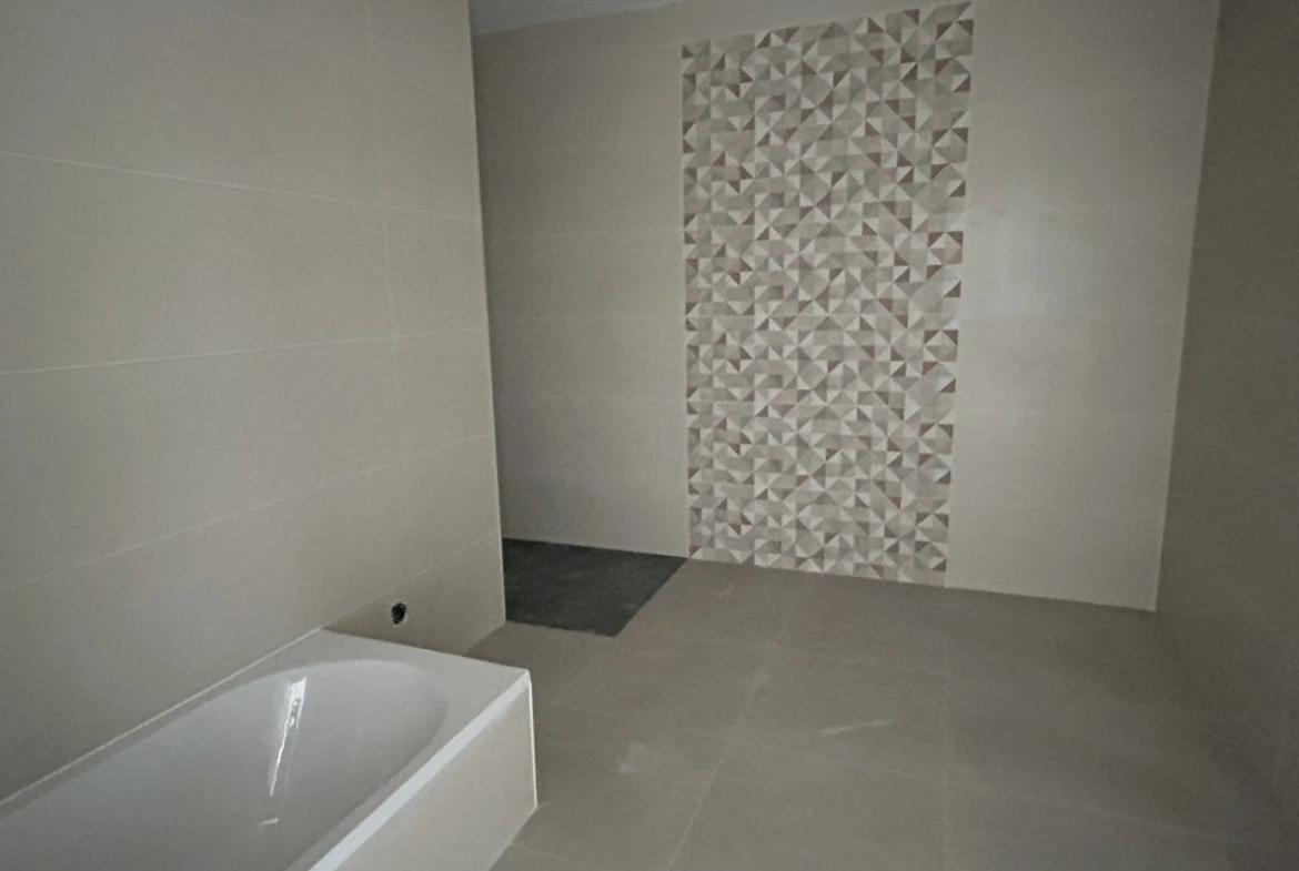 Maison neuve à vendre à Ste Bazeille - 3 chambres, jardin, proche commerces 