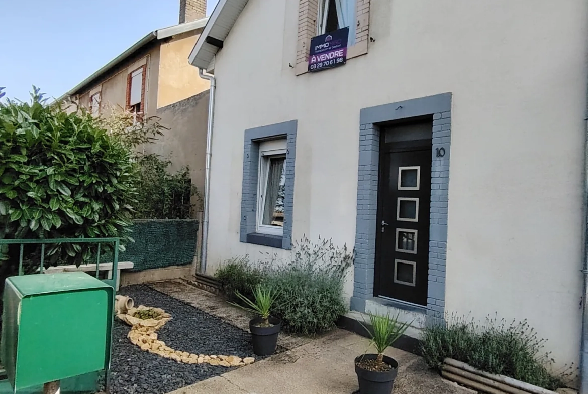 Charmante maison rénovée à Briey avec garage, terrasse et jardin proche du plan d'eau 