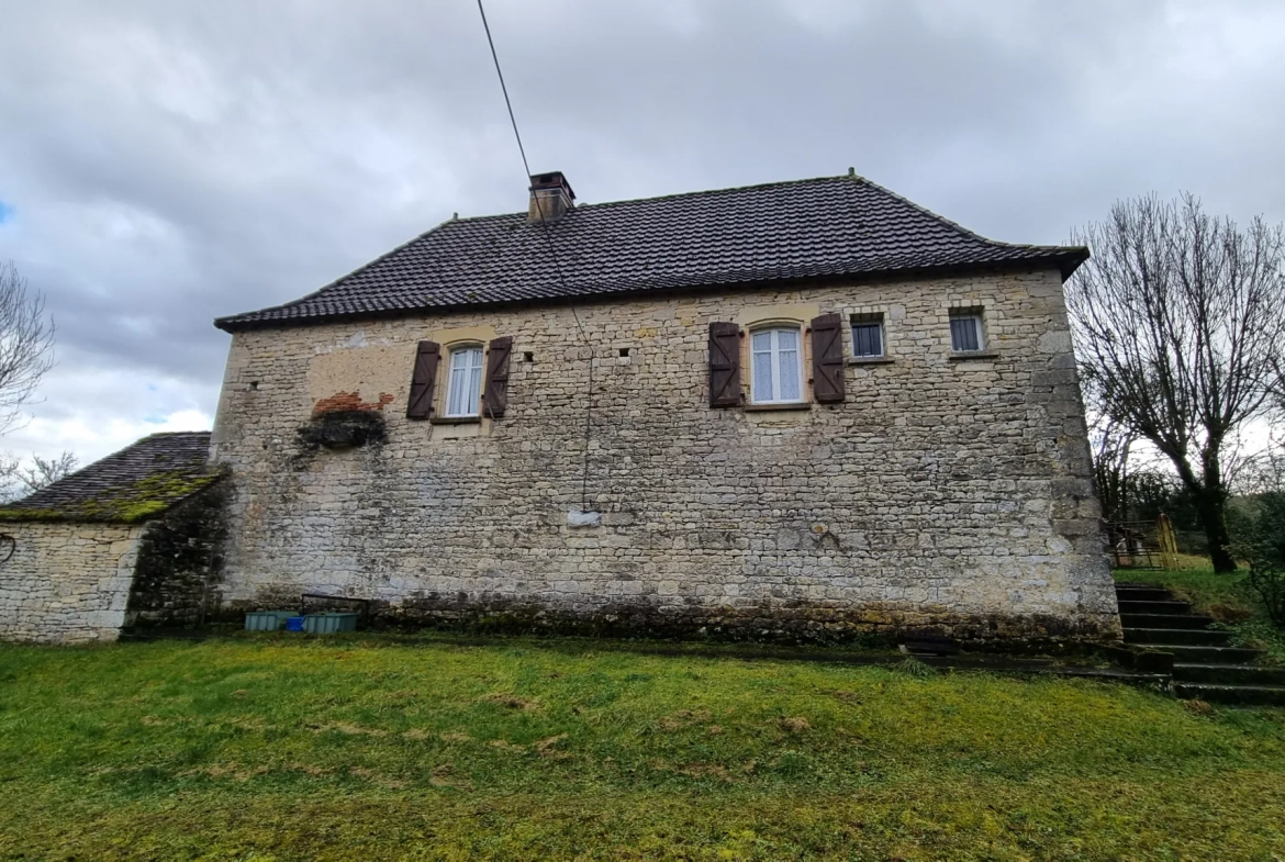 Bel ensemble immobilier en pierre avec terrain à Cahors - Fort potentiel 