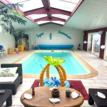 Belle maison anglo-normande avec piscine et vue sur la Seine à Arelau­ne-en-Seine