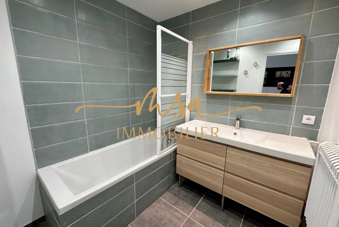 Appartement spacieux de 90 m² à Rouen avec balcon, cave et parking en secteur résidentiel 