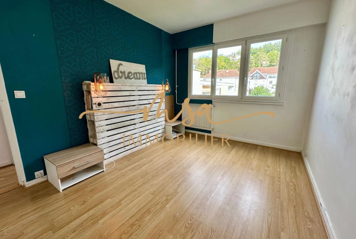 Appartement spacieux de 90 m² à Rouen avec balcon, cave et parking en secteur résidentiel 