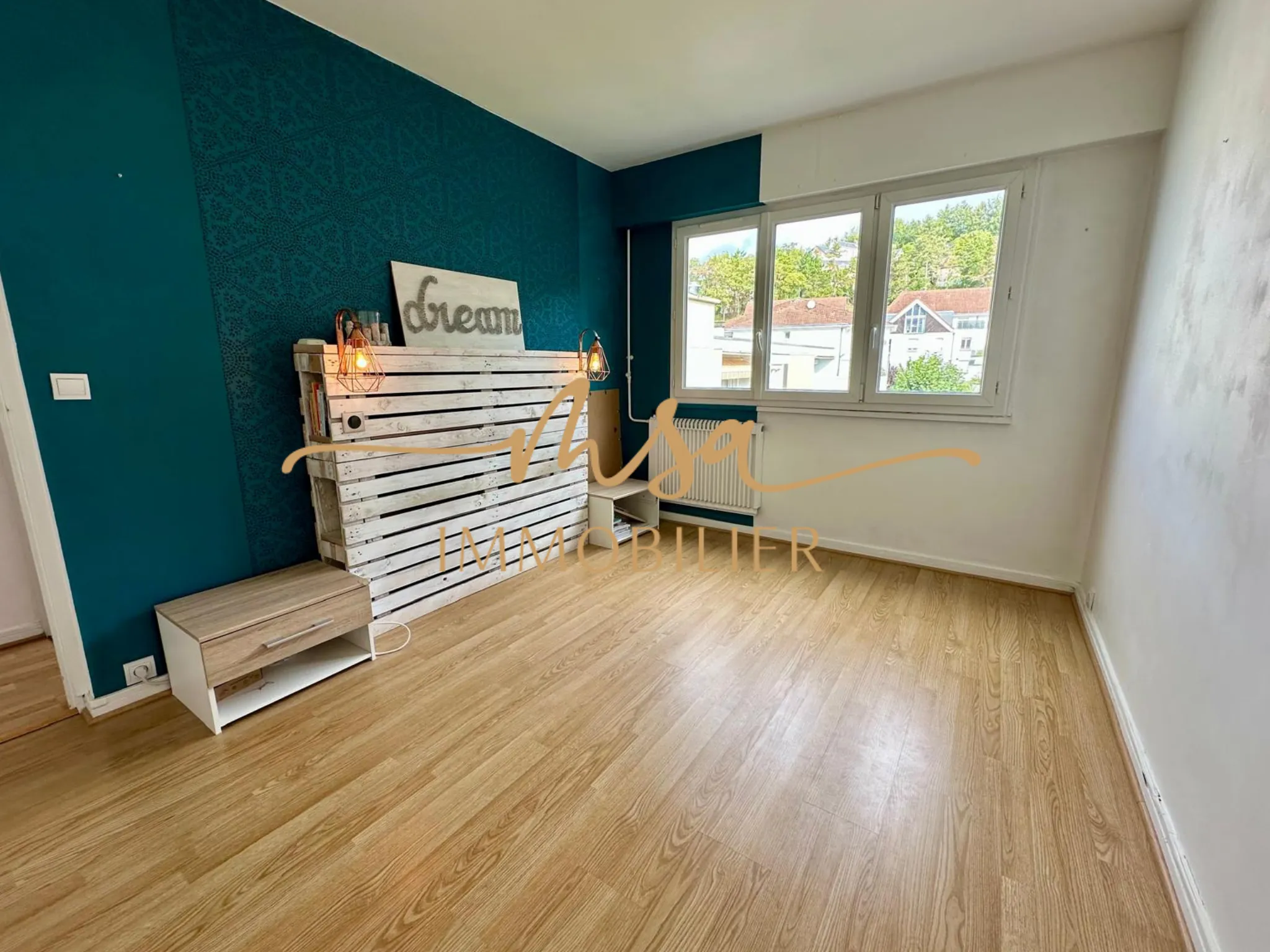Appartement spacieux de 90 m² à Rouen avec balcon, cave et parking en secteur résidentiel 