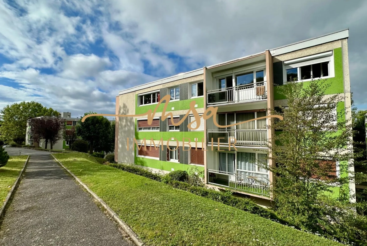 Appartement spacieux de 90 m² à Rouen avec balcon, cave et parking en secteur résidentiel 