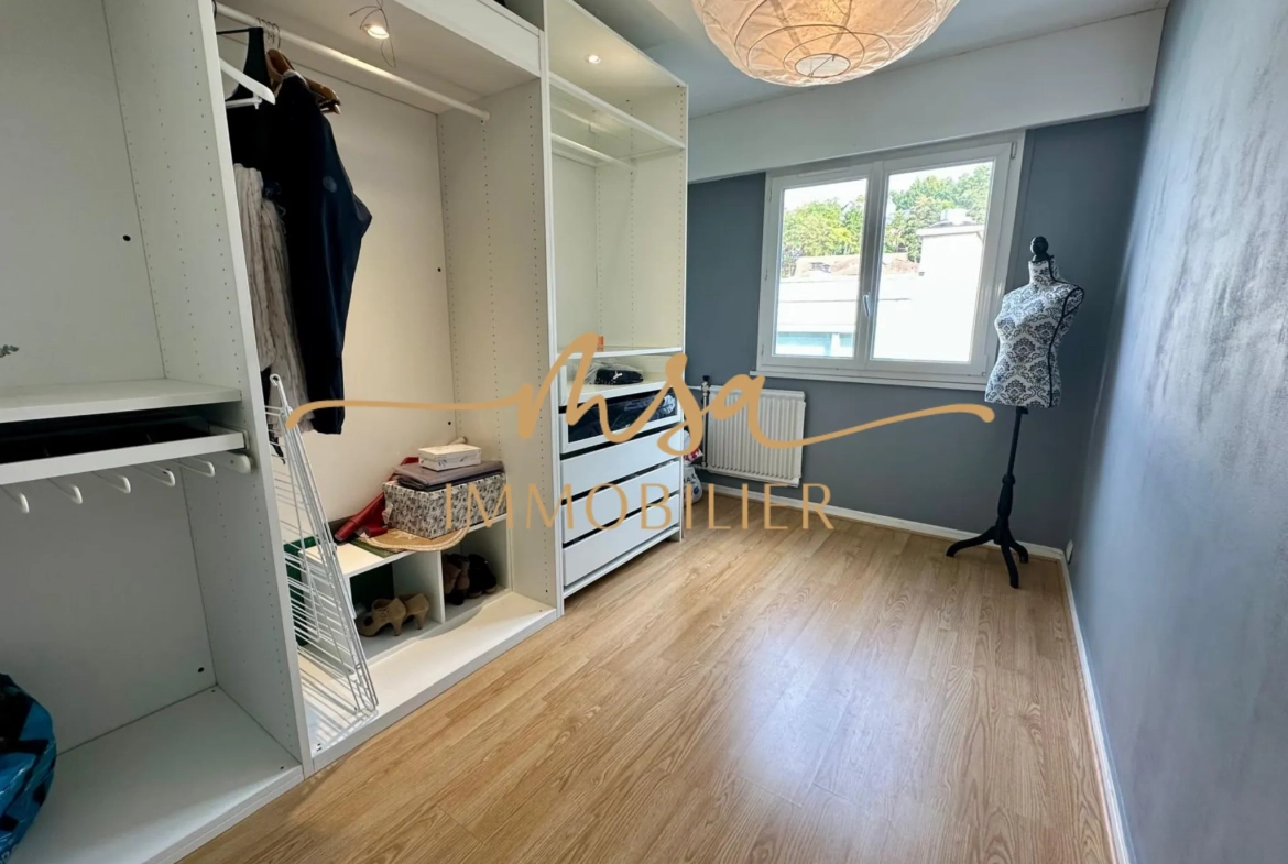 Appartement spacieux de 90 m² à Rouen avec balcon, cave et parking en secteur résidentiel 