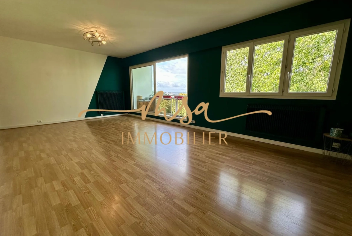 Appartement spacieux de 90 m² à Rouen avec balcon, cave et parking en secteur résidentiel 