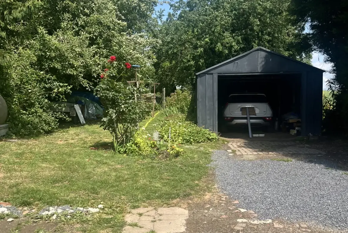 Maison à vendre à Sains Richaumont avec jardin, 3 chambres, vérandas et garage 