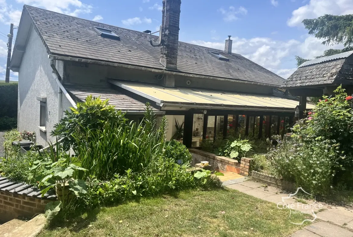 Maison à vendre à Sains Richaumont avec jardin, 3 chambres, vérandas et garage 