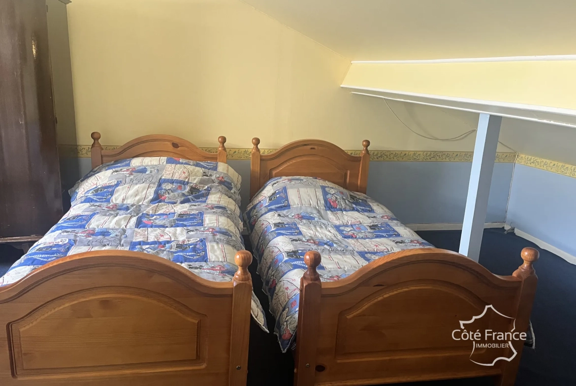 Maison à vendre à Sains Richaumont avec jardin, 3 chambres, vérandas et garage 