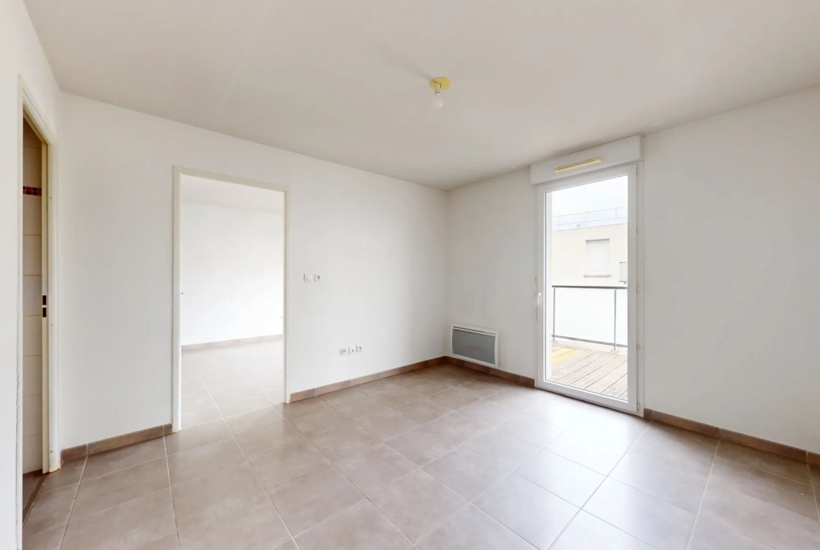 Appartement T2 avec terrasse à Toulouse - Résidence sécurisée et parking 