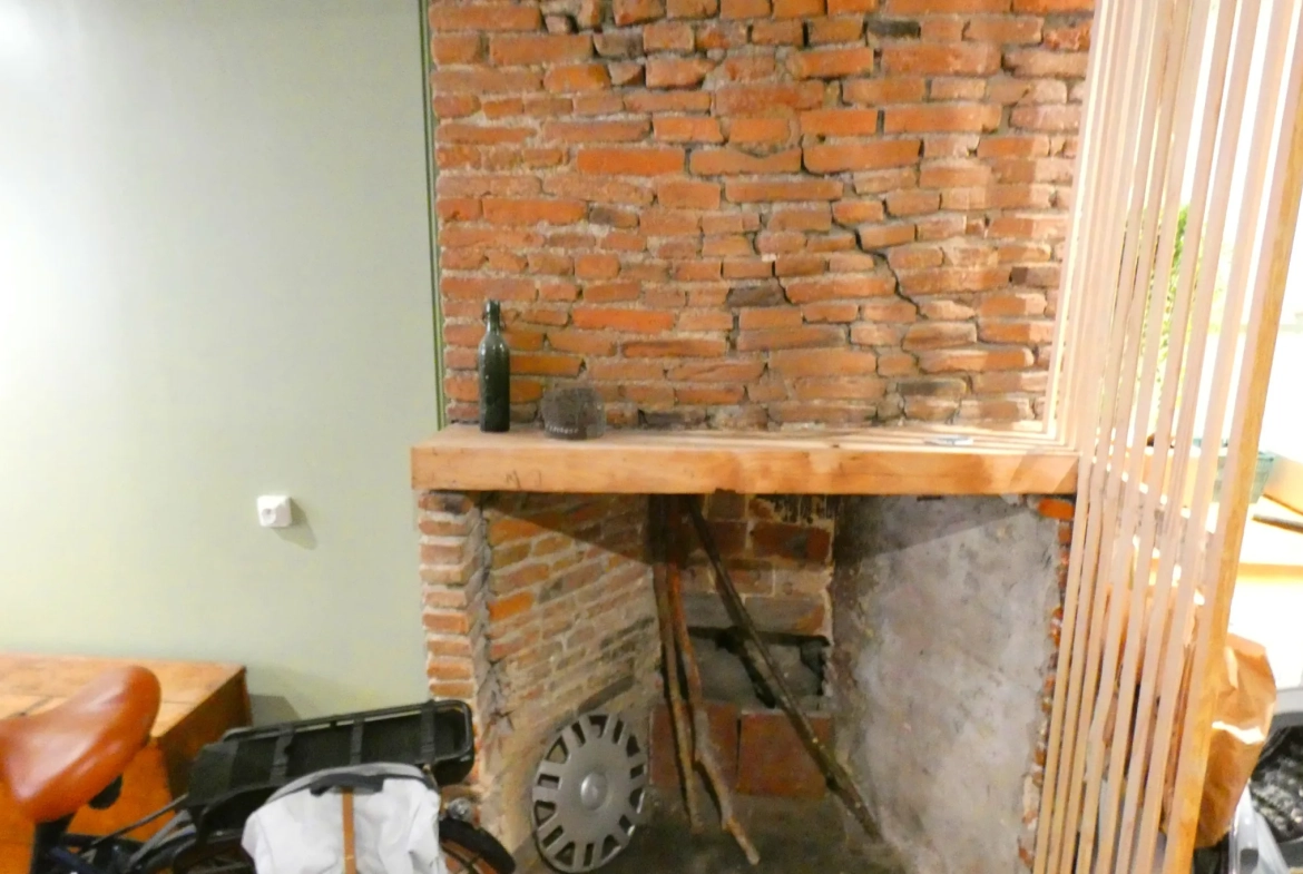 Charmante maison de ville dans le centre historique d'Aurillac avec garage et atelier 