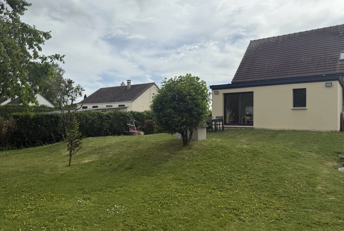 Maison familiale de 109 m² à Saint-Pierre-en-Auge avec terrain arboré 