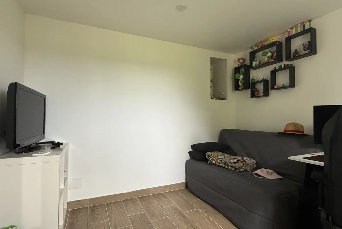 Maison familiale de 109 m² à Saint-Pierre-en-Auge avec terrain arboré 