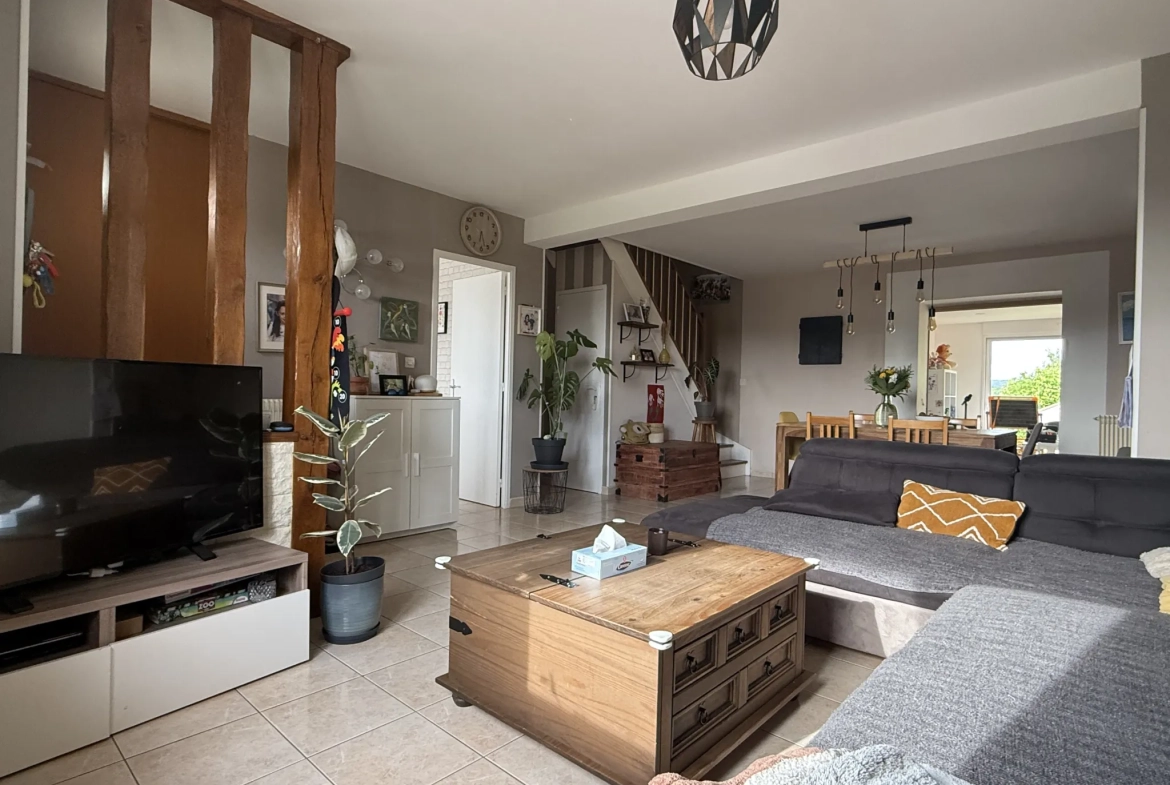 Maison familiale de 109 m² à Saint-Pierre-en-Auge avec terrain arboré 