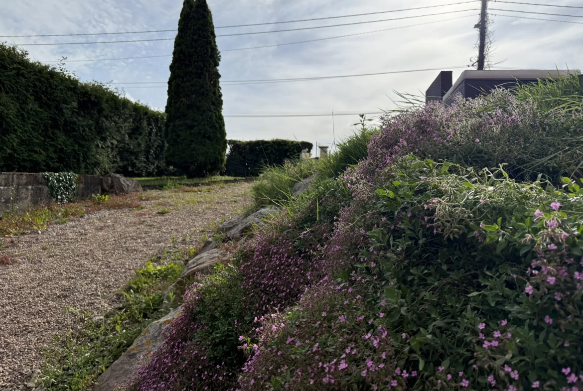 Maison familiale de 109 m² à Saint-Pierre-en-Auge avec terrain arboré 