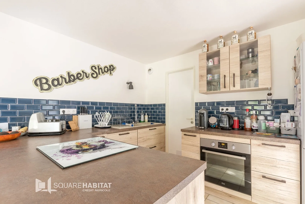 Appartement de 97m2 à Gap avec jardin, garage et cave, proche du centre-ville 