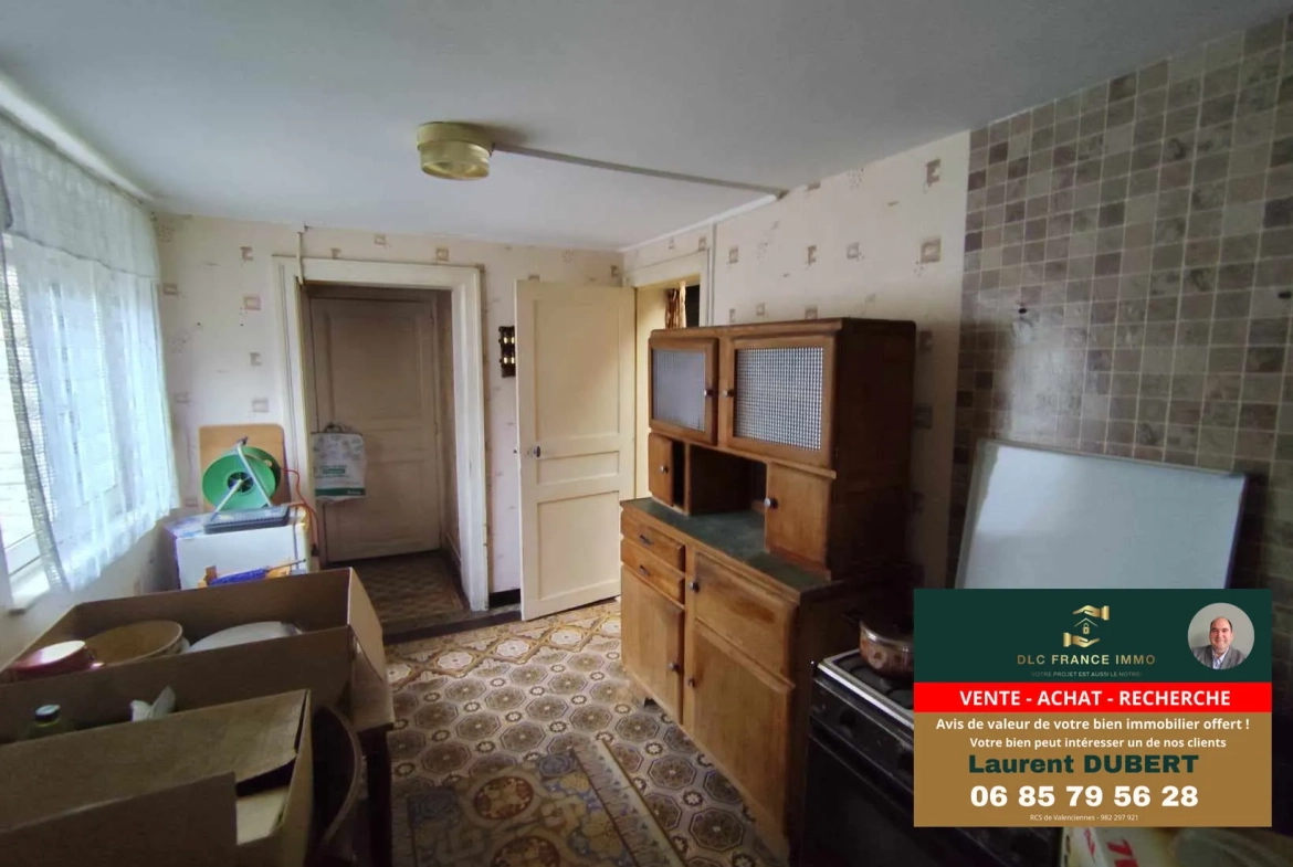 Maison à rénover avec potentiel à Aulnoye-Aymeries - Grand terrain et garage 