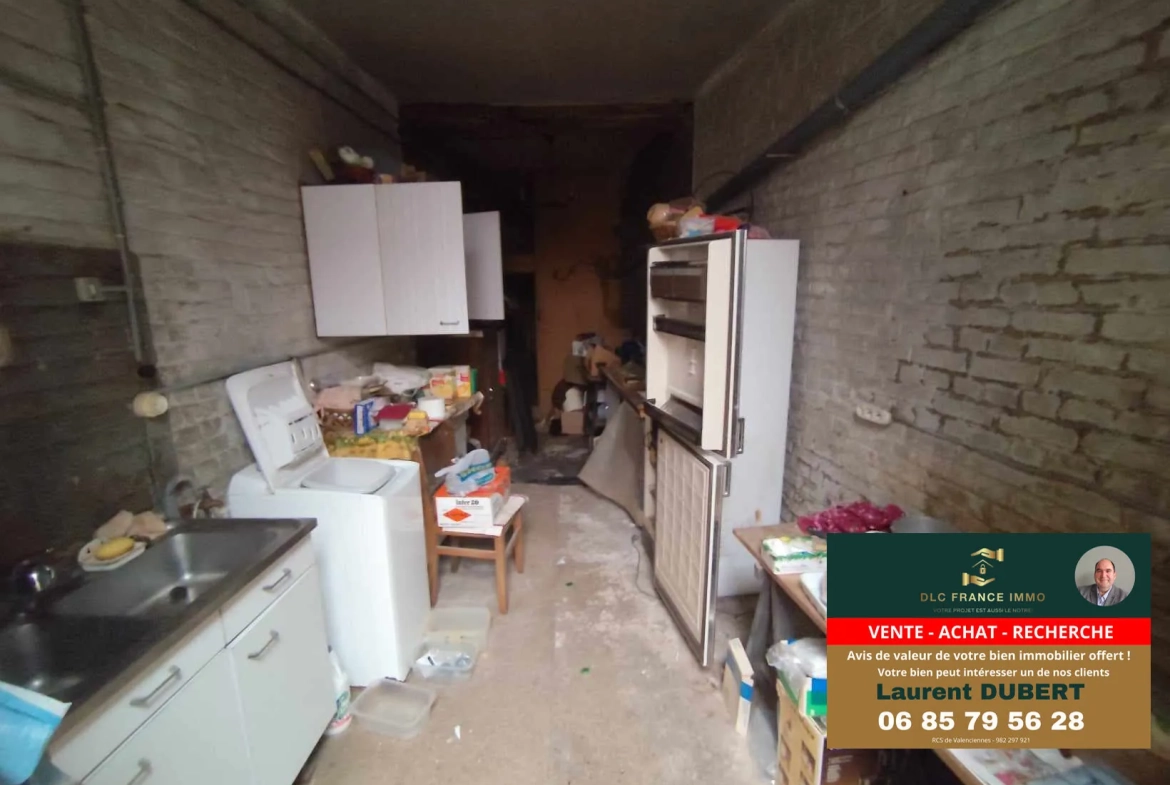 Maison à rénover avec potentiel à Aulnoye-Aymeries - Grand terrain et garage 
