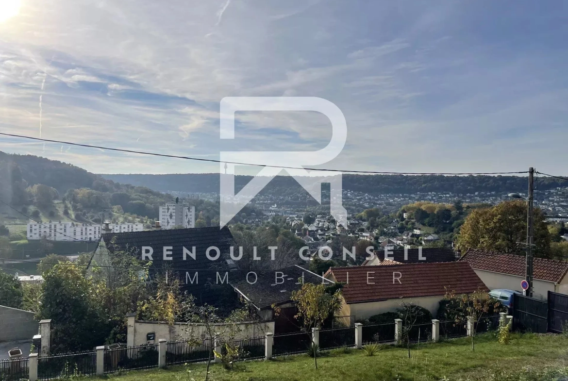Maison lumineuse à Rouen avec grand jardin et potentiel constructible 