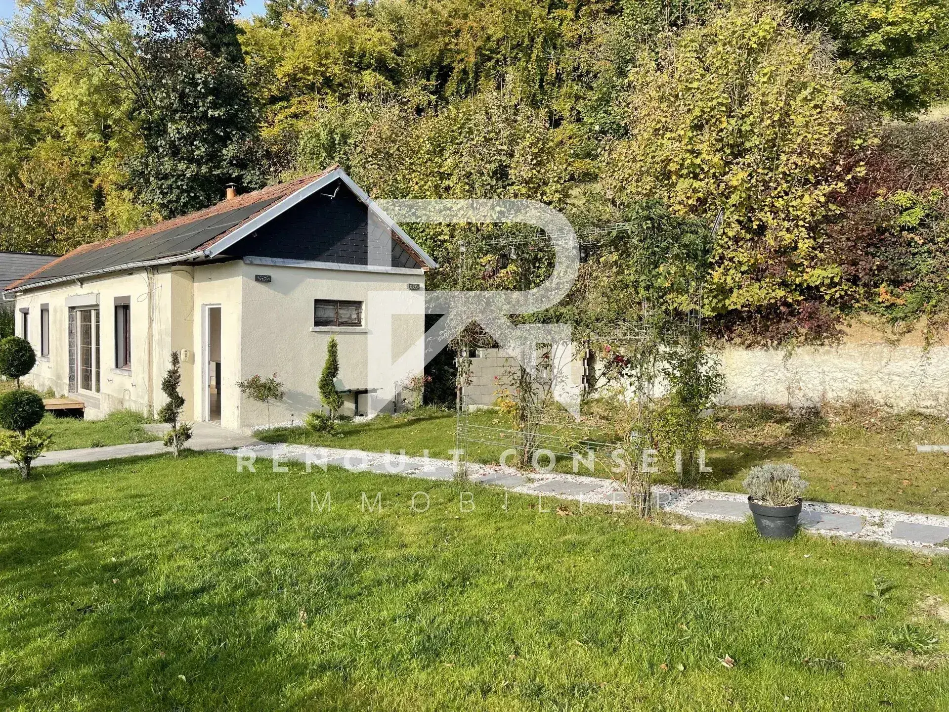 Maison lumineuse à Rouen avec grand jardin et potentiel constructible 
