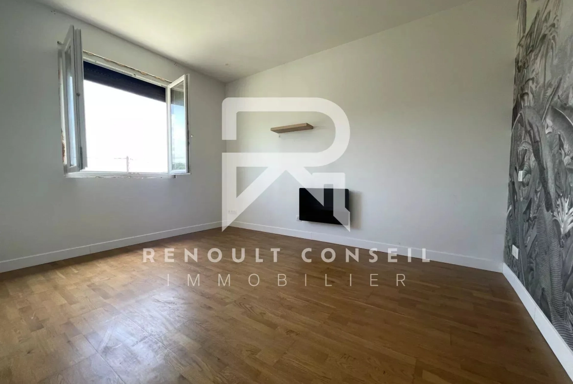 Maison lumineuse à Rouen avec grand jardin et potentiel constructible 