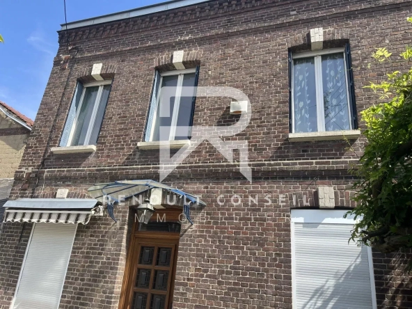 Maison en brique avec 3 chambres à Sotteville-lès-Rouen - Confort moderne et extérieur charmant