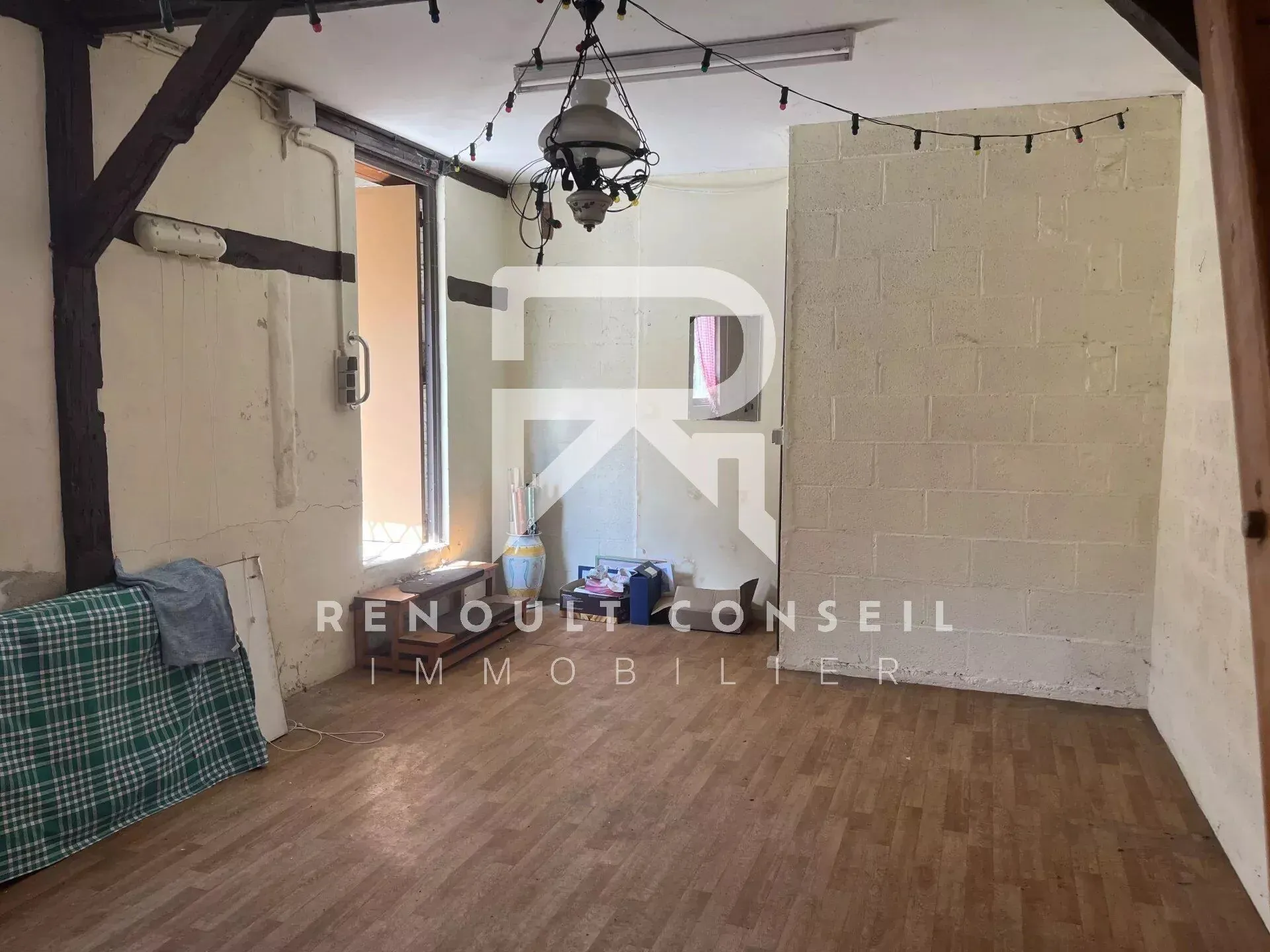 Maison en brique avec 3 chambres à Sotteville-lès-Rouen, confort moderne et extérieur convivial 