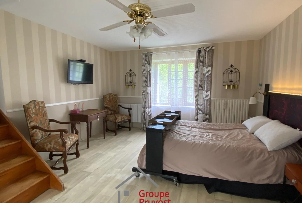 Maison de campagne rénovée à Cluny avec grand terrain et potentiel d'extension 