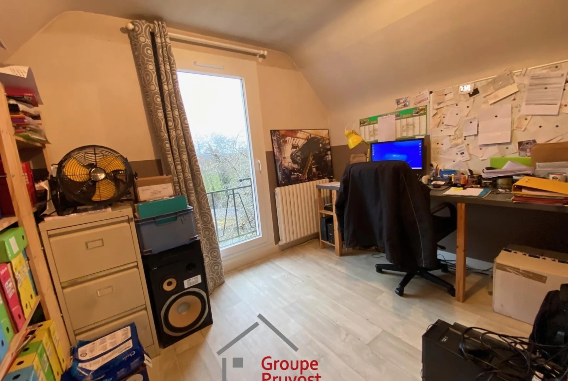 Maison de campagne rénovée à Cluny avec grand terrain et potentiel d'extension 