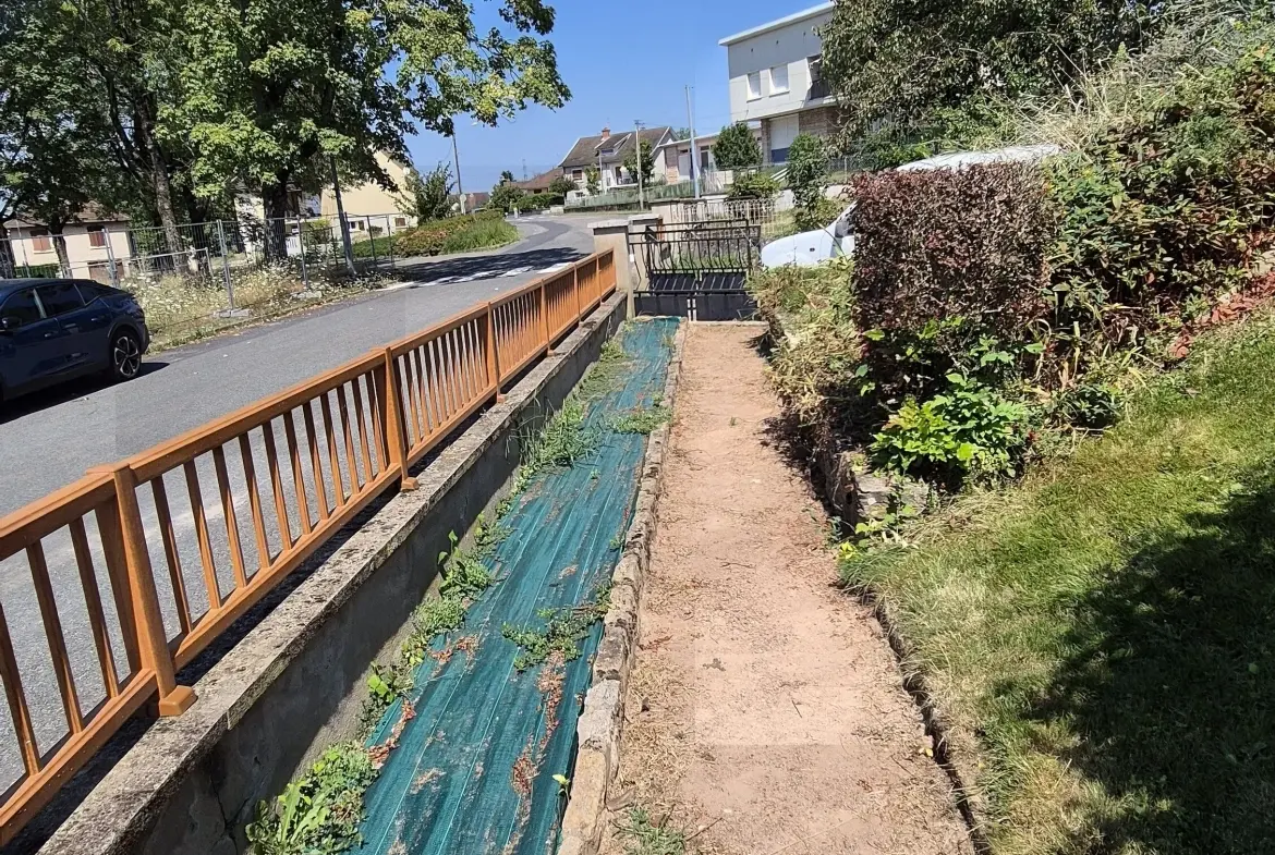 Maison à vendre à Gueugnon - 82 m² avec terrain de 630 m² et terrasse 